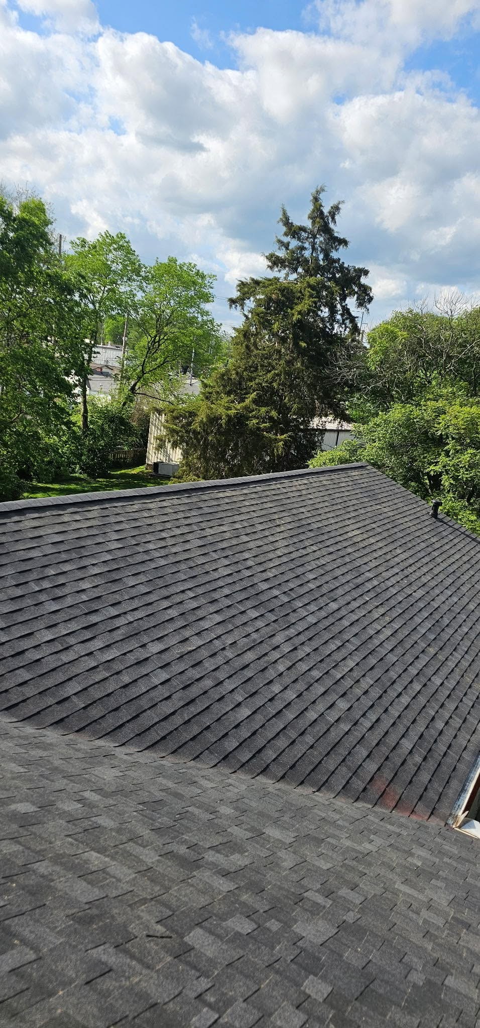 Completed shingle roof repair and replacement project
